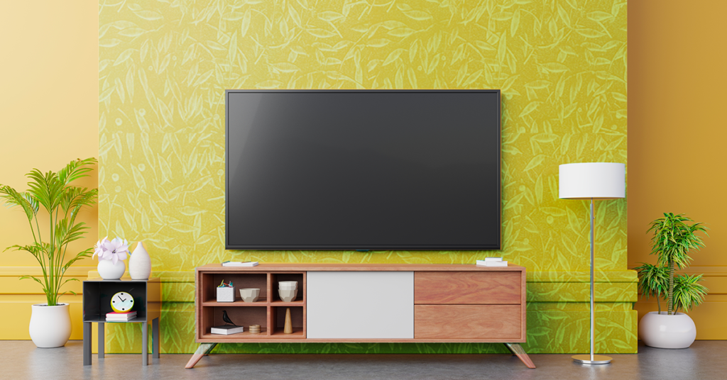 استفاده از کاغذ دیواری سبز در طراحی تی وی وال The use of green wallpaper in the design of the TV wall